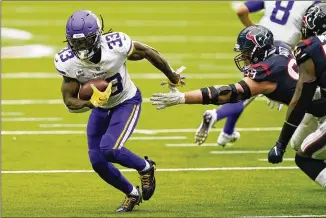  ?? DAVID J. PHILLIP/ ASSOCIATED PRESS ?? Vikings running back Dalvin Cook, who leads the NFL with 489 yards rushing, likely will miss Sunday’s game against the 0- 5 Falcons with a sore groin.