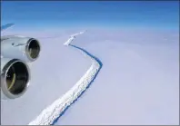  ?? AP PHOTO ?? This Nov. 10, 2016 aerial photo released by NASA, shows a rift in the Antarctic Peninsula’s Larsen C ice shelf. A vast iceberg with twice the volume of Lake Erie has broken off from a key floating ice shelf in Antarctica, scientists said Wednesday.