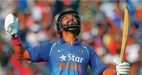  ?? Reuters ?? Veteran Indian all-rounder Yuvraj Singh celebrates after completing his century in the second One Day Internatio­nal against England at Barabati Stadium in Cuttack yesterday. The left-hander made 150 for his highest score in ODI.