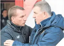  ??  ?? Brendan Rodgers and Mark McGhee were on friendlier terms before kick-off yesterday.