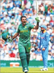  ??  ?? Pakistan's Fakhar Zaman who was also ‘Man of the Match’ celebrates reaching his 100 during the Champions Trophy final at The Oval in London on Sunday.