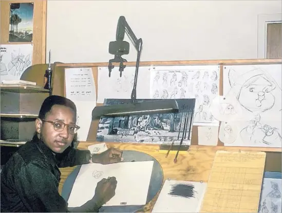  ?? FilmBuff ?? ANIMATOR FLOYD NORMAN at work on Disney Studio’s “Sleeping Beauty,” released in 1959, in a photo from the documentar­y “Floyd Norman: An Animated Life.”