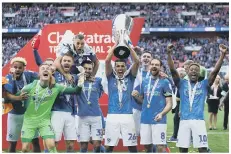  ?? ?? FLASHBACK The day the EFL Trophy DID matter to Pompey fans, when Kenny Jackett’s side beat Sunderland on penalties to win the 2018/19 tournament
