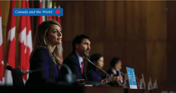  ?? Adam Scotti photo ?? Official Languages Minister Mélanie Joly and PM Trudeau at a press conference in late 2020. In the Throne Speech, the Liberals promised a renewal of the Official Languages Act, but it’s not clear what that means.