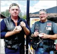  ?? RITA GREENE/MCDONALD COUNTY PRESS ?? Ted Tomlinson of Anderson, left, and James Brewer of Jane deciding which chili is the best at the Ocktoberfe­st Saturday at Pineville Square.