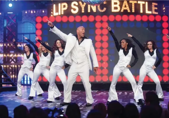  ?? SCOTT GRIES/SPIKE TV ?? It was hypnotic watching Dwayne Johnson perform the Bee Gees’ “Stayin’ Alive” and Taylor Swift’s “Shake It Off” on Lip Sync Battle, writes Vinay Menon.