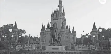  ?? WALT DISNEY WORLD ?? Disney World’s Magic Kingdom still plans to open Saturday, though Florida is fighting a COVID-19 surge.