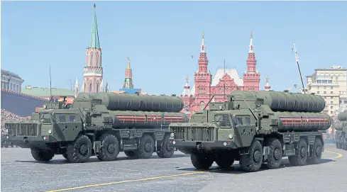  ?? REUTERS ?? Russian servicemen drive S-400 missile air defence systems, made by Rostec State Corp, during ceremonies in Red Square, Moscow, marking the 73rd anniversar­y of the victory over Nazi Germany in World War II on May 9, 2018.