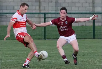  ??  ?? Kilanerin’s Matty Forde gets his shot away during the SFC clash with St. Martin’s.