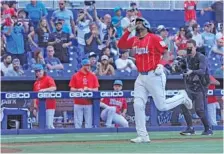  ?? AP PHOTO/WILFREDO LEE ?? The Miami Marlins’ Josh Bell celebrates as he heads to home plate after hitting a home run during the first inning Saturday.