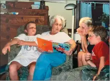  ?? COURTESY OF LIZANNE JOHNSON ?? Irene Johnson and her great-grandson Morgan, far right, along with family friends Kate and Mike Litscher.