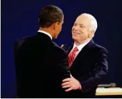  ??  ?? IN THIS OCT. 7, 2008, FILE PHOTO, Democratic presidenti­al candidate Sen. Barack Obama, D-Ill., (left) and Republican presidenti­al candidate Sen. John McCain, R-Ariz., greet each other at the start of a townhall-style presidenti­al debate at Belmont University in Nashville, Tenn.