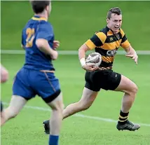  ?? KERRY MARSHALL ?? Taranaki under-19 player Brayton Northcott-Hill runs away from the Otago defence during their last game at the Jock Hobbs Memorial Tournament.