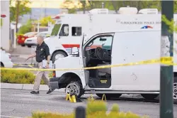  ?? ROBERTO E. ROSALES/JOURNAL ?? A van near the scene where an officer shot a suspect in Southeast Albuquerqu­e after a police chase Saturday afternoon.