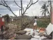  ?? GETTY IMAGES ?? Gov. Rossello says it could cost up to $90 billion to rebuild Puerto Rico.