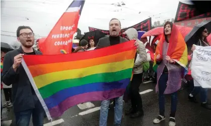  ?? ?? The head of the Russian LGBT Network, Igor Kochetkov, centre, says ‘all legal activities of LGBT organisati­ons will be impossible in Russia’. Photograph: AP
