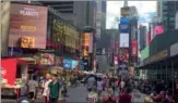  ?? NANCY KONG / FOR CHINA DAILY ?? Tourists from different countries are gathering in Times Square, New York on Wednesday. The city is attracting over 50 million travelers a year, including a large number of Chinese tourists.