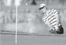  ?? JOHN MCCALL/SUN SENTINEL ?? Justin Thomas gets out of a sand trap on the 11th hole during the first round of the Honda Classic at PGA National in Palm Beach Gardens on Thursday.