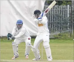  ?? Picture: Chris Davey FM4446880 ?? Whitstable’s Ollie Robinson looks to cut during his knock of 61 against The Mote
