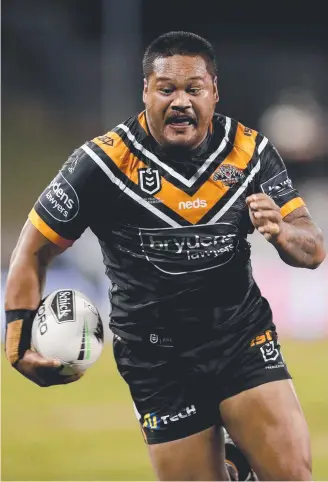  ?? ?? Former Tiger Joey Leilua (main) has taken aim at Michael Maguire. Pictures: Getty, AAP