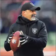  ?? AJ Mast / Associated Press ?? Las Vegas Raiders interim head coach Rich Bisaccia throws a pass before a game against the Cincinnati Bengals on Saturday in Cincinnati.