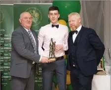  ??  ?? Footballer of the year Eoin keddy with John Evans and Ciaran Dutton.