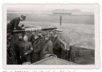  ??  ?? ■ Men of an RAD Flak Battery paint another victory ring on their gun barrel.