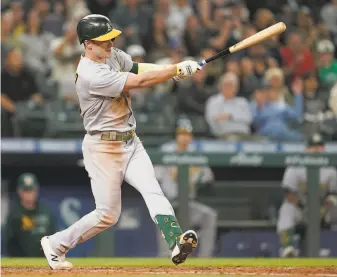  ?? Ted S. Warren / Associated Press ?? A’s leadoff man Mark Canha had hits in each of his first six games after coming off the IL.