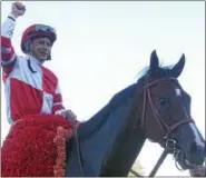  ?? PHOTO PROVIDED BY SPENCER TULIS ?? Three-year-old filly Songbird, with jockey Mike Smith aboard, upped her record to a perfect 11-0 with a win in the $1,000,000 Cotillion Stakes at Parx Saturday.