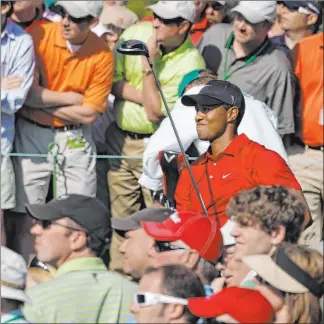  ?? The Associated Press ?? Tiger Woods, competing in the Masters in 2009, on the roaring from the galleries at Augusta National Golf Club: “It echoes there. It travels. It’s unlike any place in the world.”