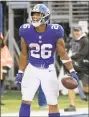  ?? Bill Kostroun / Associated Press ?? Giants running back Saquon Barkley celebrates after rushing 68 yards for a touchdown against the Jaguars on Sunday.