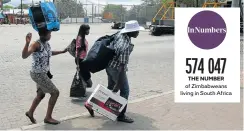  ?? Picture: Gallo Images ?? Zimbabwean­s near the Beitbridge border cross over to Zimbabwe last year on hearing that ex-president Robert Mugabe had been placed under house arrest.