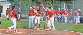  ?? Adam Dortch ?? The Sonoravill­e High School baseball team is hoping for many home run celebratio­ns around the plate like this one last year when first baseman Easton Childs hit a grand slam for the Phoenix in a Region 6-3A victory.