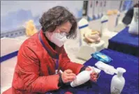  ?? PHOTOS PROVIDED TO CHINA DAILY ?? Right: A local artist paints on porcelain vases during the festival.