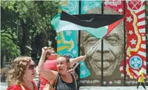  ?? PILAR OLIVARES / REUTERS ?? People take part in a pro-Palestinia­n demonstrat­ion amid a meeting of G20 foreign ministers in Rio de Janeiro, Brazil, on Thursday.