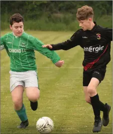  ??  ?? Cian Rossiter about to challenge Tadhg Deegan of All Blacks.