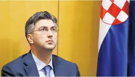  ??  ?? Die HDZ unter dem kroatische­n Premier Andrej Plenković kann nun entweder allein weiterregi­eren oder Neuwahlen ausrufen.