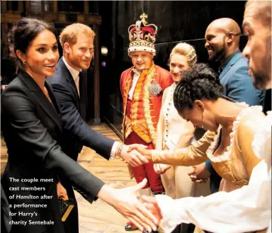  ??  ?? The couple meet cast members of Hamilton after a performanc­e for Harry’s charity Sentebale
