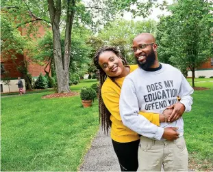  ?? Tribune News Service ?? Brandon Jennings and Shenay Jeffrey pose for a photo outside Jennings’ apartment in Pittsburgh, Pa. The couple, who have been dating for two years, will move into a different apartment in August.