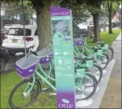  ?? JOSEPH PHELAN — JPHELAN@ DIGITALFIR­STMEDIA. COM ?? Bike share arrived in Saratoga Springs at Broadway and Congress outside of Congress Park.