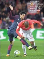  ?? AFP ?? PSG’s Javier Pastore (left) vies for the ball with Monaco’s Djibril Sidibe. —