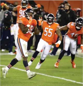  ?? JONATHAN DANIEL/ GETTY IMAGES ?? Roquan Smith ( 58), celebratin­g after a sack in the third quarter against the Vikings on Monday night at Soldier Field, has emerged as one of the best linebacker­s in the NFL.