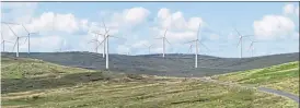  ??  ?? Evelyn Morrison with husband Donnie on their Shetland croft, top, and how the Viking Energy wind farm will look, above