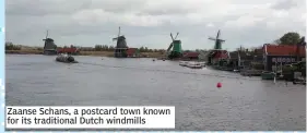  ??  ?? Zaanse Schans, a postcard town known for its traditiona­l Dutch windmills