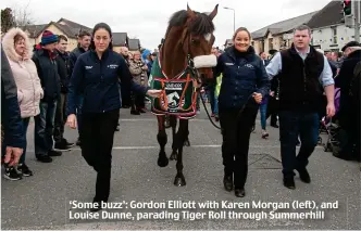  ??  ?? ‘Some buzz’: Gordon Elliott with Karen Morgan (left), and Louise Dunne, parading Tiger Roll through Summerhill