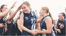  ?? Picture: MARK WILSON ?? Denby Taylor is congratula­ted by teammates after being named best-on-ground.