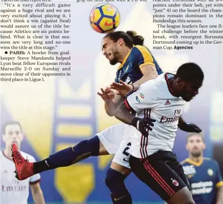  ?? EPA PIC ?? AC Milan’s Franck Kessie (right) and Verona’s Martin Caceres battle for the ball in their Serie A match at Bentegodi Stadium on Sunday.