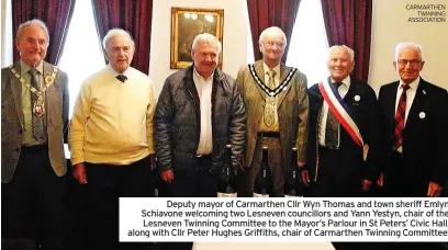  ?? CARMARTHEN TWINNING ASSOCIATIO­N ?? Deputy mayor of Carmarthen Cllr Wyn Thomas and town sheriff Emlyn Schiavone welcoming two Lesneven councillor­s and Yann Yestyn, chair of the Lesneven Twinning Committee to the Mayor’s Parlour in St Peters’ Civic Hall, along with Cllr Peter Hughes Griffiths, chair of Carmarthen Twinning Committee.