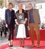  ??  ?? Keri Kenney-Silver, Pink and Ellen Degeneres attend a ceremony honoring Pink with the 2,656th star on The Hollywood Walk Of Fame.