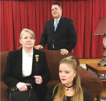  ?? YELLOW DRAGON PRODUCTION­S CONTRIBUTE­D PHOTO ?? Jennifer Baggett as Mac, foreground; Jenny Bacon as Virginia, seated on loveseat; and Jerry M. Draper as Emil, standing, are the cast of “Three Viewings.”